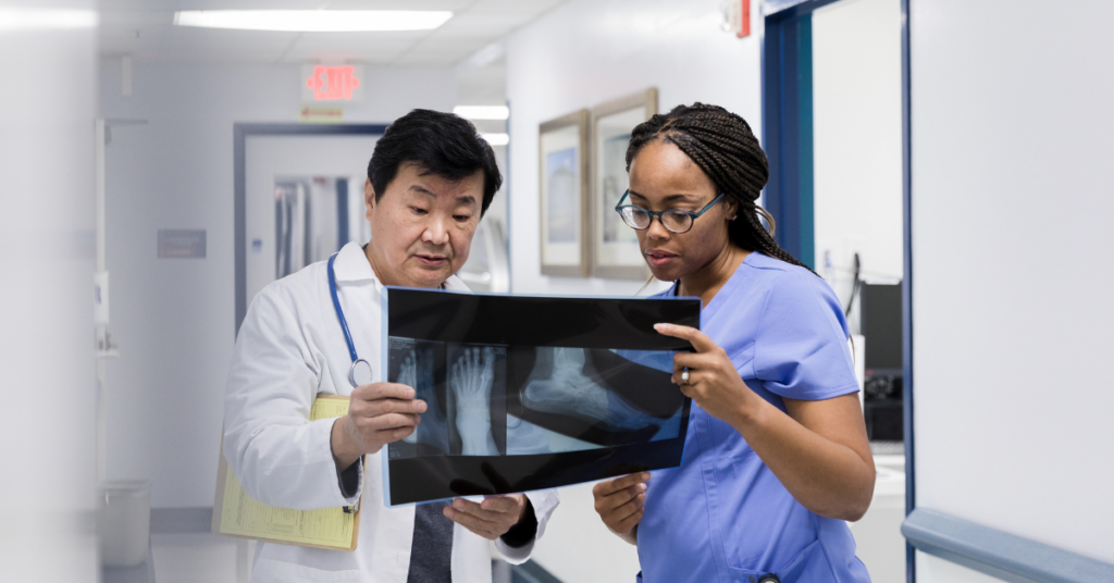 orthopedists examining x-ray