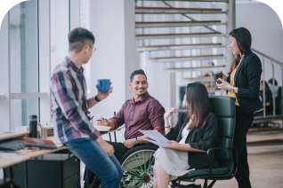 Group of young professionals discussing Patient Success Platforms